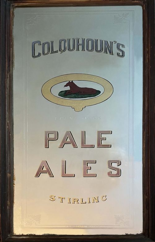 <p>A mirror advertising Andrew Colquhoun & Co's pale ales</p>