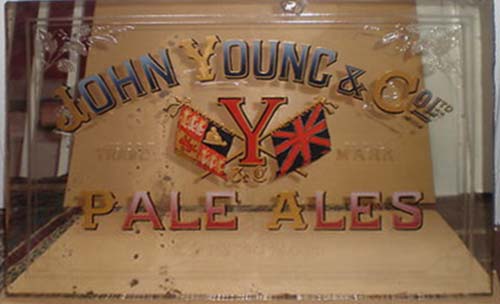 <p>A mirror advertising John Young & Co Ltd's Pale Ales.</p>