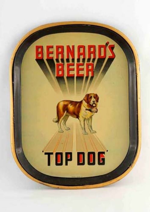 <p>A tray promoting Thomas and James Bernard Ltd, with the slogan 'Top dog'.</p>