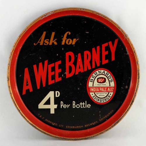 <p>A tray advertising Thomas and James Bernard Ltd's Wee Barney, at 4d per bottle.</p>